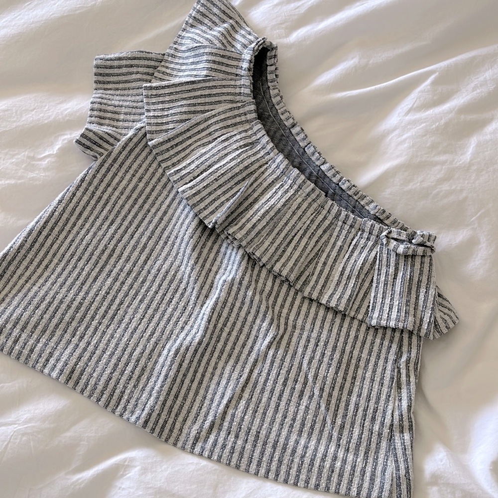 One armed short sleeve blouse